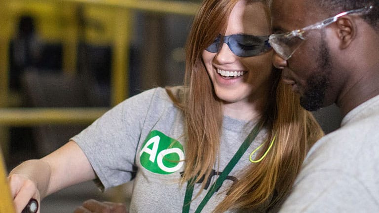 AO Smith Careers - employees smiling while working AO Smith Careers - employees smiling while working
